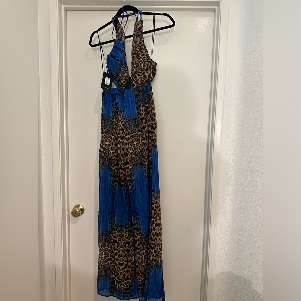 Blue leopard jumpsuit never worn size xs